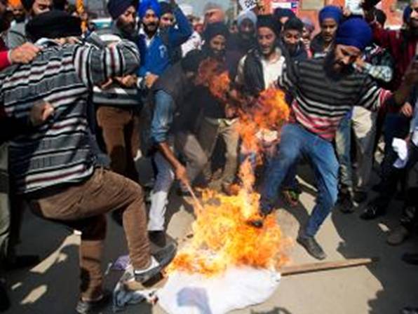 Sikh protesters continued to block roads in Punjab's Malwa region on Sunday to protest against the desecration of Guru Granth Sahib, the holy scripture of Sikh religion.