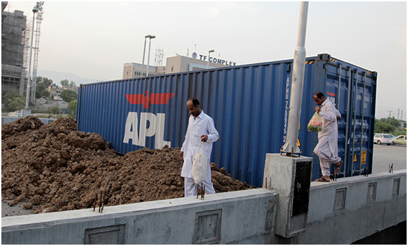 Industrialists in Punjab are concerned over detention of their containers loaded with goods, both for export and also local supplies to various cities. — Photo by Reuters