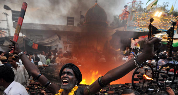 Devotees gather at the shrine of Madhu Lal Hussain at the start of an annual festival. AFP