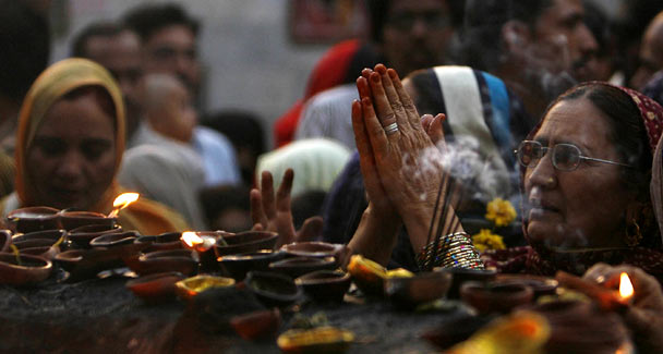 Devotees pray at the shrine of Muslim saint Madhu Shah Lal Hussain in Lahore.  Reuters