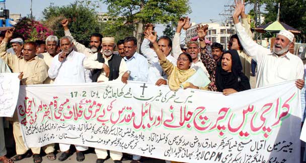 Wednesdays violence in Karachis Taiser Town was reportedly sparked by hateful graffiti on a church wall. - APP photo